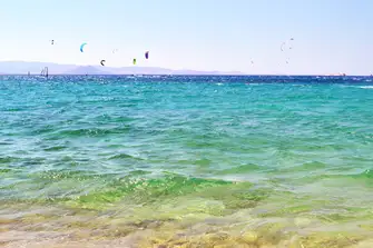 Spend the day in the sun kitesurfing or windsurfing at&nbsp;Mikri Vigla on the west coast of Naxos