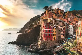 Soak up the sun, culture and history ashore, like here in Riomaggiore, the southern-most of the five Cinque Terre villages