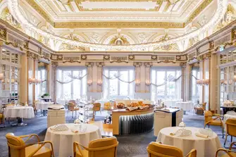Treat your tastebuds to mouthwatering cuisine and freshly baked bread at Alain Ducasse's three-starred Le Louis XV