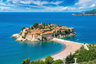 Visit one of the many crescent-shaped beaches Budva has to offer