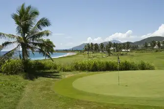 Enjoy the picturesque holes on this course that reach to the Caribbean Sea's calm waves and the Atlantic Ocean's black sand beaches
