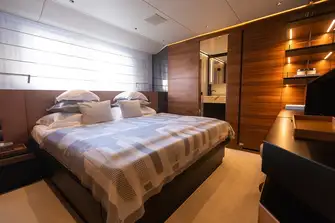 One of the light, bright lower deck double guest suites
