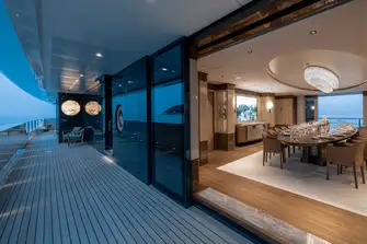 The main deck's formal dining room and sit-up bar have&nbsp;access to wide&nbsp;sidedeck on both sides