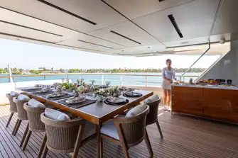 Spectacular open-air dining on the upper deck aft