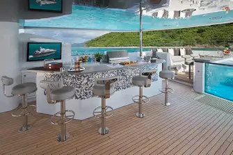 With its misting system, glass-backed jacuzzi, bars, BBQ, TV, dayhead and exercise equipment, guests can spend all day on the sun deck