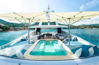 A huge 93sqm (1,001sqft) sun deck has a bar, BBQ, open-air dining and a 10-person jacuzzi