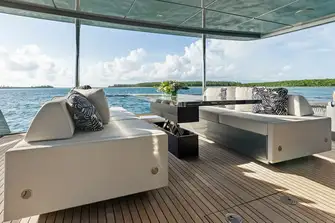 A convertible diner-daybed on the main deck aft