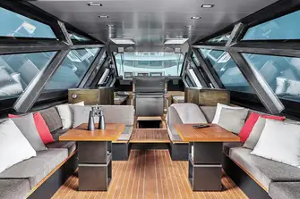 The saloon has extensive glazing with muscular carbon fibre mullions and incredible views