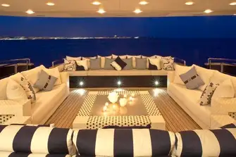A spacious lounge on the main deck aft